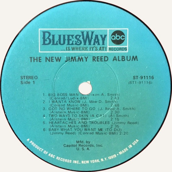 Record label for 'The New Jimmy Reed Album' by ABC Records with tracklist on a blue background.
